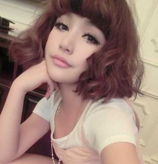女生时尚陶瓷烫卷发发型图片精选